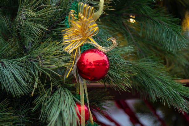istock Christmas tree on the street as a background 1436936606