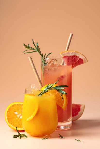 istock Orange and grapefruit juice with rosemary and ice. 1436937207