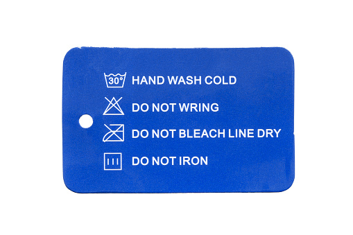 Care instructions clothing label isolated on white background