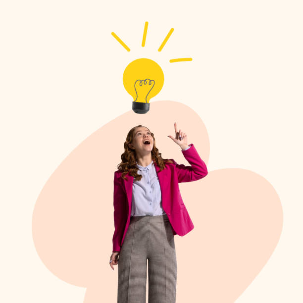 istock Excited young girl pointing up at light bulb. Idea, innovation, creativity, solution concept. Businesswoman having a good idea for business. Thought process 1436937991