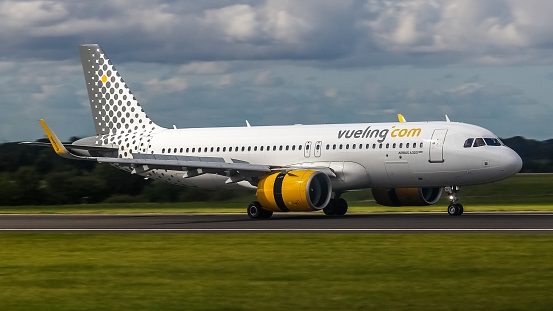 Manchester Airport, United Kingdom - 15 September, 2022: Vueling Airbus A320 NEO (EC-NIY) arriving from Barcelona, Spain.