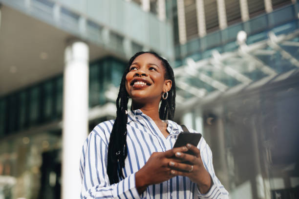 istock Thoughtful young businesswoman using a smartphone during her morning commute 1436950330