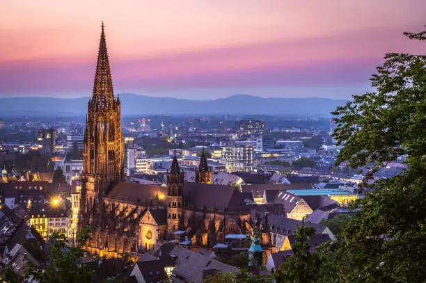 The cityscape of Freiburg im Breisgau during a breathtaking sunset in Germany