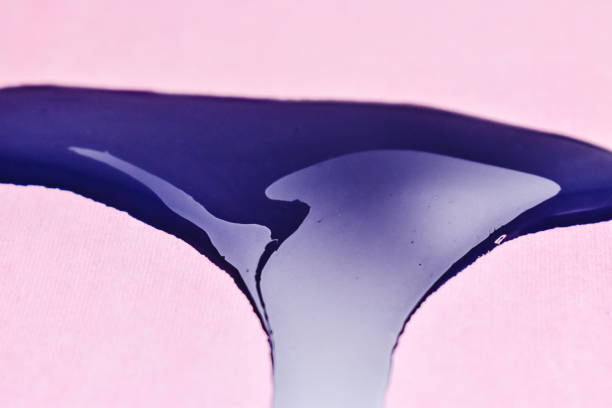 istock Purple color stain on a pink background 1436960305