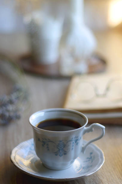 istock Tea, Cookies, Book, Candles and Lavender 1436961764