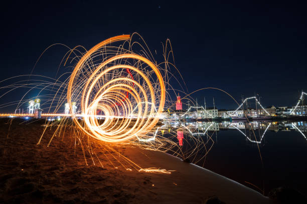 istock Fantastic light effect with many sparkles near the water 1436963946