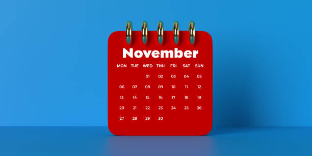 Monthly spiral desktop Calendar 2023 template: 3D illustration on blue surface, copy space. Red date planner with dropped shadow. Can be croppped to square composition. Set of 12 Months. Week starts with Monday, in English language white color.