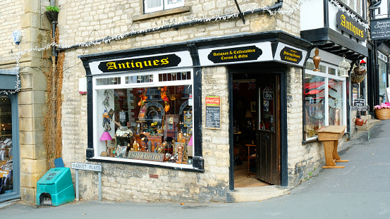 Pickering, Yorkshire, UK - 26th September, 2022: An antique shop in the centre of Pickering. Pickering is a bustling town on the edge of the North York Moors.
