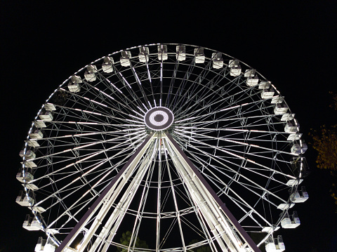 Ferris Wheel in city at night