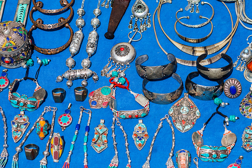 full frame shot of Moroccan traditional jewelry and accessories in the bazaars of Chefchaouen, Morocco - Moroccan culture and craftsmanship