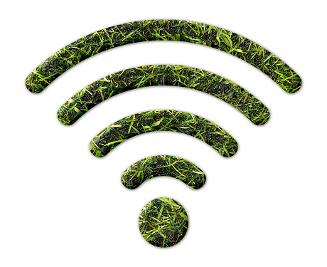 A wifi sign shape with grass texture isolated on a white background