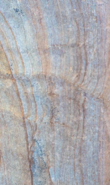 istock Gray stone with orange lines. Stone texture 1436972121