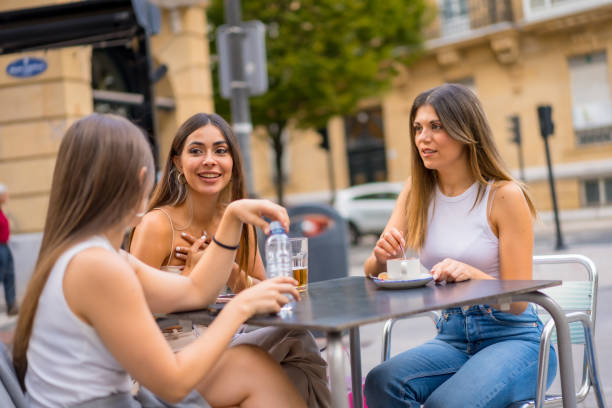 istock Friends enjoying an afternoon on a cafeteria terrace 1436973515