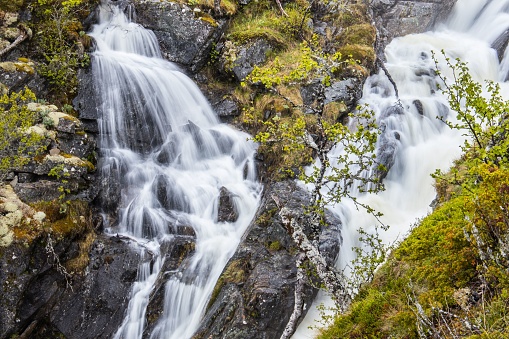 Small waterfall in der Hardangervidda mountains in Norway