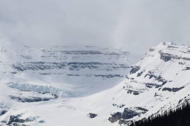 istock Snowy mountains around lake Louise, Canada 1436977011