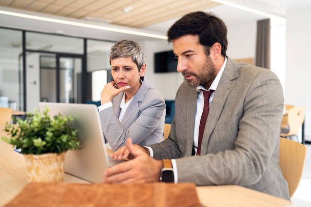 istock Business colleagues working together in the office 1436980068