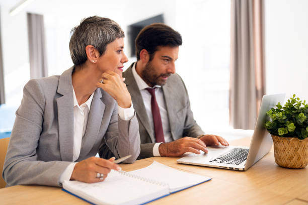 istock Business colleagues working together in the office 1436980108