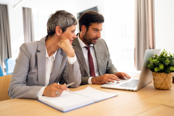 istock Business colleagues working together in the office 1436980123