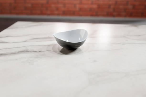 istock White cereal bowl on marble kitchen counter 1436980261