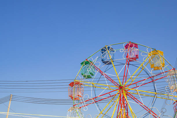 istock Ferris wheel on the background of blue sky 1436980596