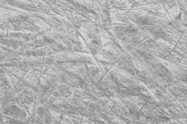 istock Frozen ice skating surface as background, above view. Winter season 1436981507