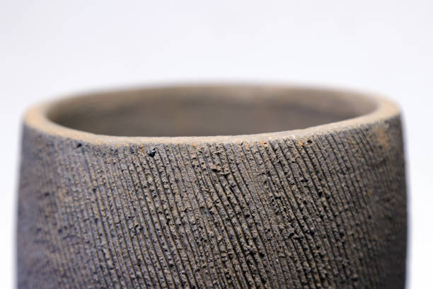 istock Inspired fromTanegashima ware, traditional Japanese pottery, rustic Jomon-style striped porcelain pot head. 1436983436