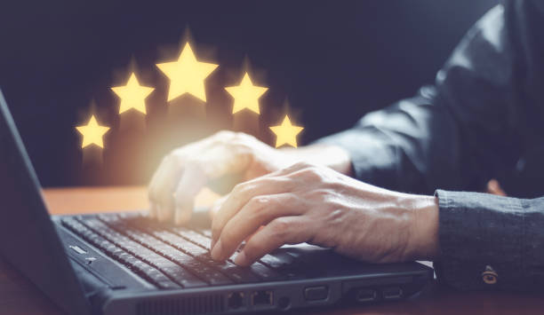 istock Customer evaluation feedback. men in suit Giving Positive Review for Client's Satisfaction Surveys. giving a five star rating. Service rating, satisfaction concept. 1436984972