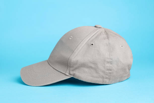 istock Stylish grey baseball cap on light blue background 1436987660