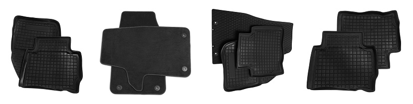 Set with black car floor mats on white background, top view. Banner design