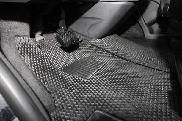 istock Black rubber car floor mat in auto 1436988599