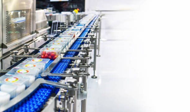 istock Food products box transfer on Automated conveyor systems industrial 1436991962