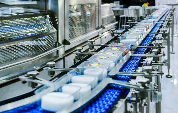istock Food products box transfer on Automated conveyor systems industrial 1436993058