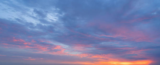 istock Sunset sky. Abstract nature background. Dramatic blue with orange colorful clouds in twilight time. 1436995401