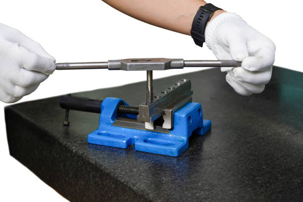 istock Stainless steel threaded taps by hand taps on a white background,for threading tap wrench 1436995623
