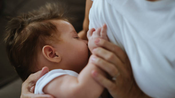 istock Mother breastfeeding her newborn son 1436995742