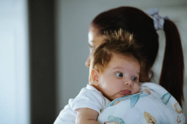 istock Young mom carrying around her baby boy 1436995908