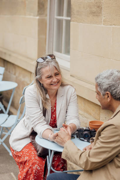 istock Senior Couple Bonding at a Cafe 1436999030