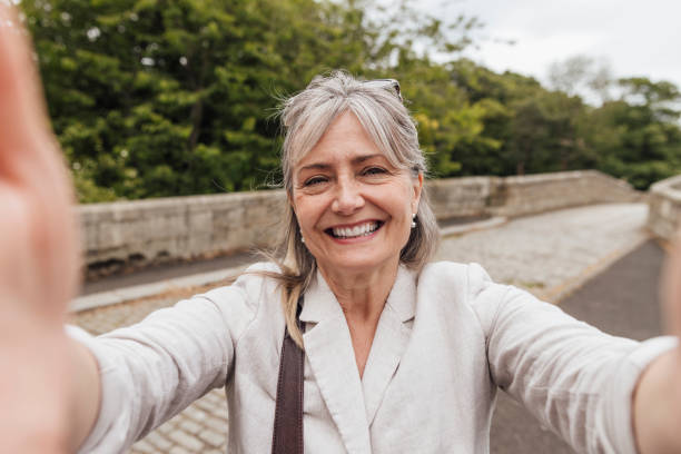 Senior Woman Selfie on Staycation stock photo