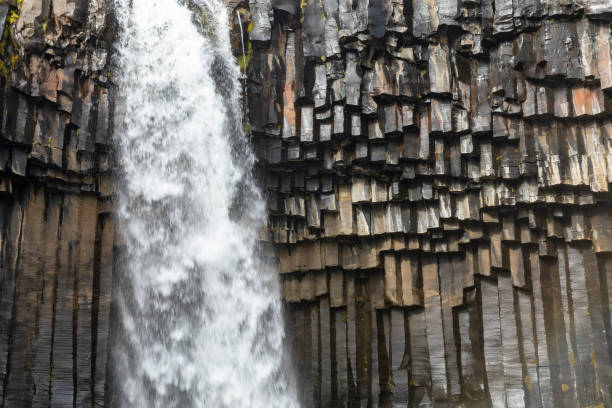 istock columnar Basalt lava rock with distinctive flat sided columns caused by lava cooling 1437004263