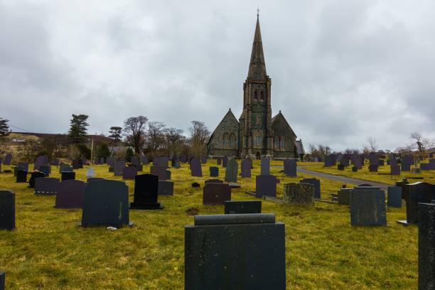 istock Creepy graveyard with the cloudy sky 1437006132