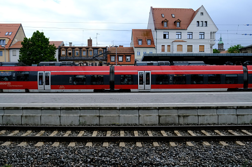 Passenger stands on a platform at Erlangen Train Station in Germany on July 23, 2022.