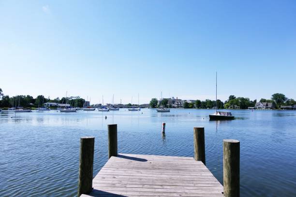 istock Wooden Dock at marina. Blue sky. Summer 1437012979