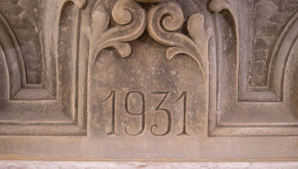 Old fountain year engraving made of stone