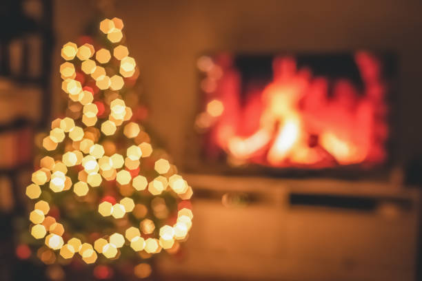istock Blurred Christmas room with tree and bokeh lighting. New year concept and background 1437018317