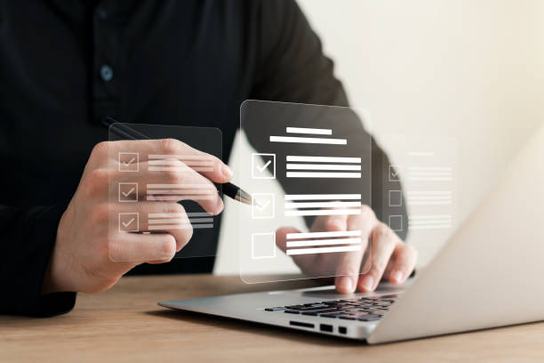 istock Businessman working with laptop a symbol of top service ISO Certification Document Management System Quality assurance. 1437024855