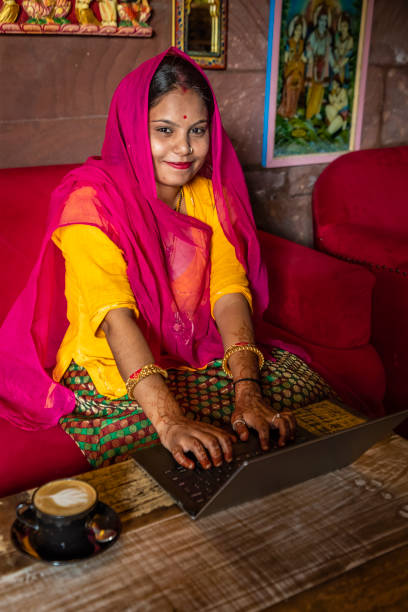 istock Young Indian woman using laptop, Jodhpur, India 1437030323
