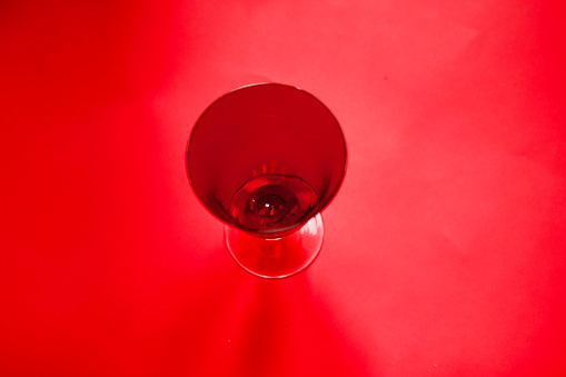 Red Water Glass with red background