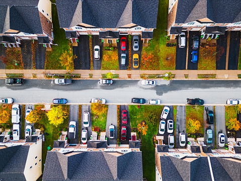 Aerial drone view of townhouses on an October morning.