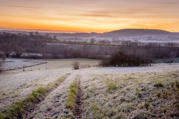 istock Scenic view of a dramatic sunset over the field 1437043756