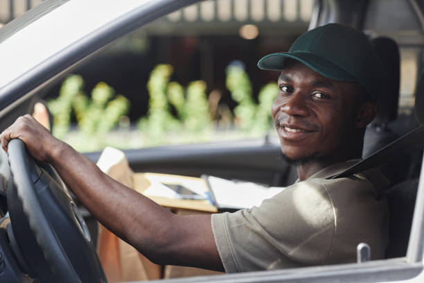 istock Black Man In Delivery Truck 1437054394